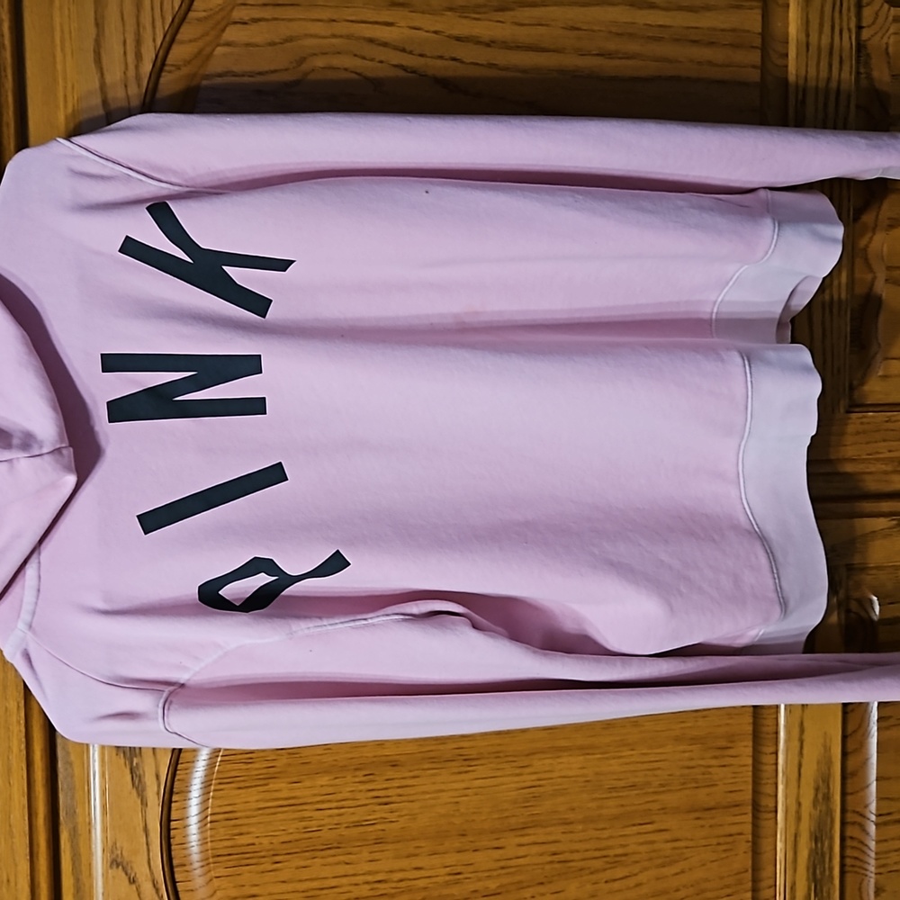 ZIPPER UP BRAND PINK HOODIE SIZE L USED HAS A SPOT ON BACK